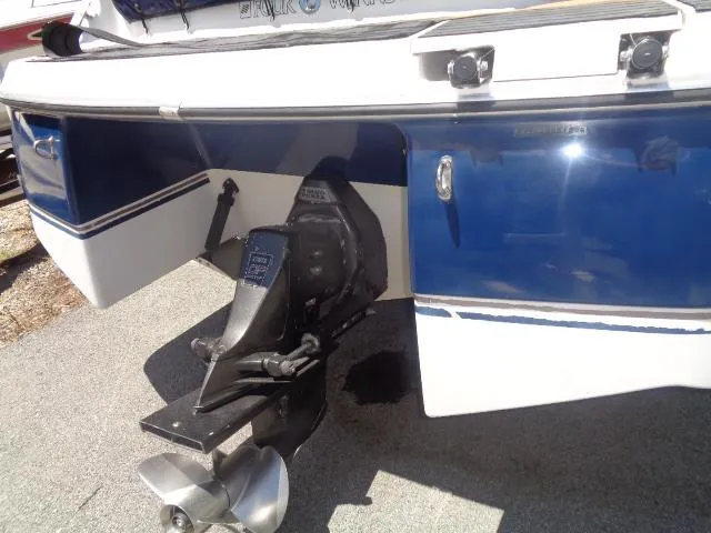 Slide: The Image of 1996 Four Winns 240 Horizon boat stern with outboard motor. - 4