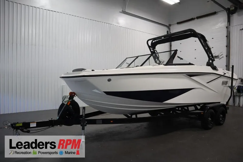 The Image of 2024 Heyday H22 boat on trailer in indoor showroom. - 1