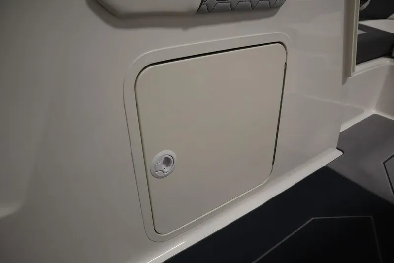 Slide: The Image of 2024 Heyday H22 boat storage compartment door. - 25