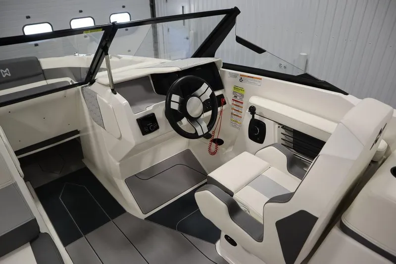 Slide: The Image of 2024 Heyday H22 boat interior with steering wheel and seating. - 26