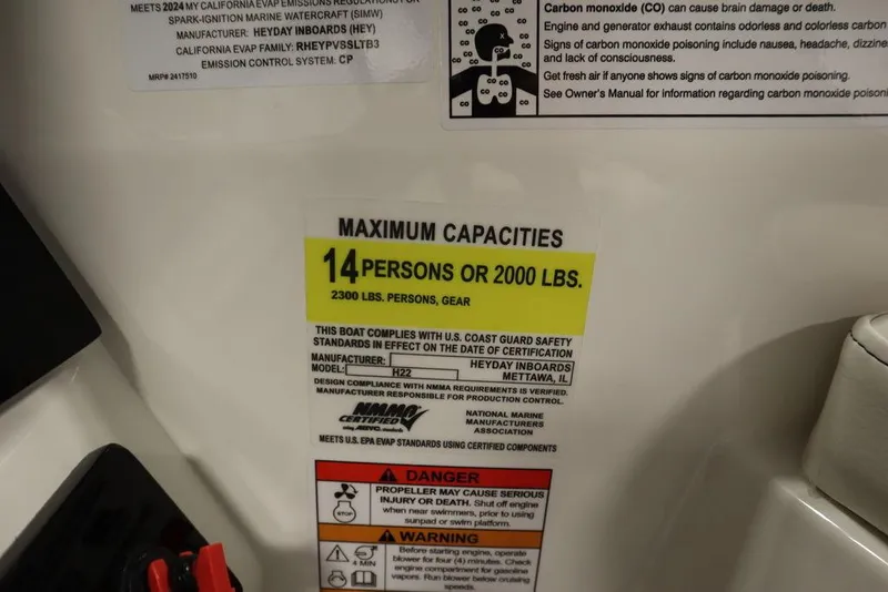 Slide: The Image of 2024 Heyday H22 boat capacity label: 14 persons or 2000 lbs. - 35