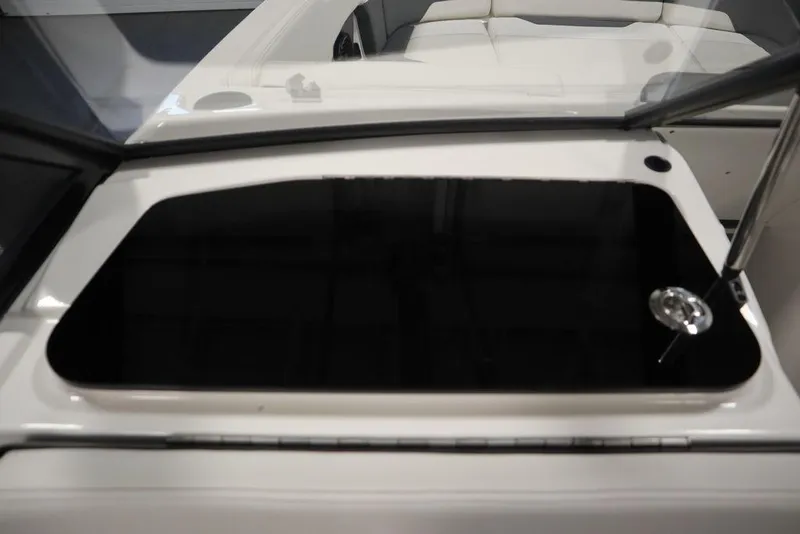 Slide: The Image of 2024 Heyday H22 boat interior with sleek black and white design. - 40