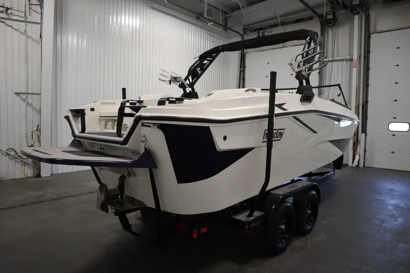 Slide: The Image of 2024 Heyday H22 boat on trailer in indoor storage facility. - 5