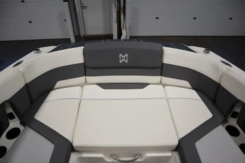 Slide: The Image of 2024 Heyday H22 boat interior with cushioned seating and modern design. - 14
