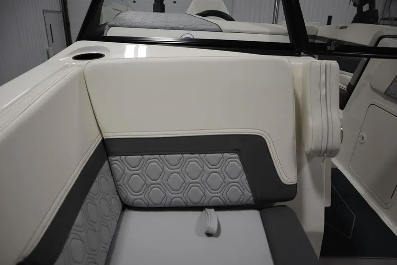 Slide: The Image of 2024 Heyday H22 boat interior with white and gray seating. - 16
