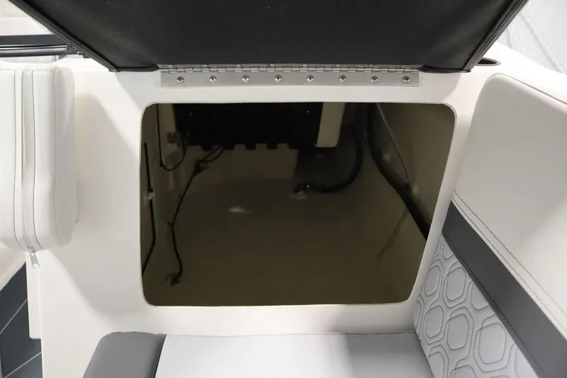Slide: The Image of 2024 Heyday H22 boat storage compartment with open hatch. - 22