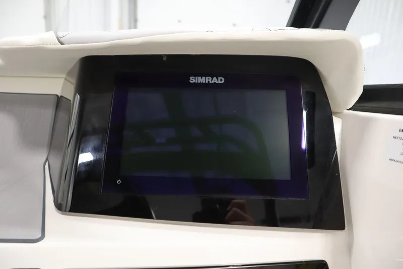 Slide: The Image of Simrad display on 2024 Heyday H22 boat dashboard. - 29