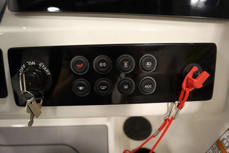 Slide: The Image of 2024 Heyday H22 boat control panel with ignition switch and accessory buttons. - 33