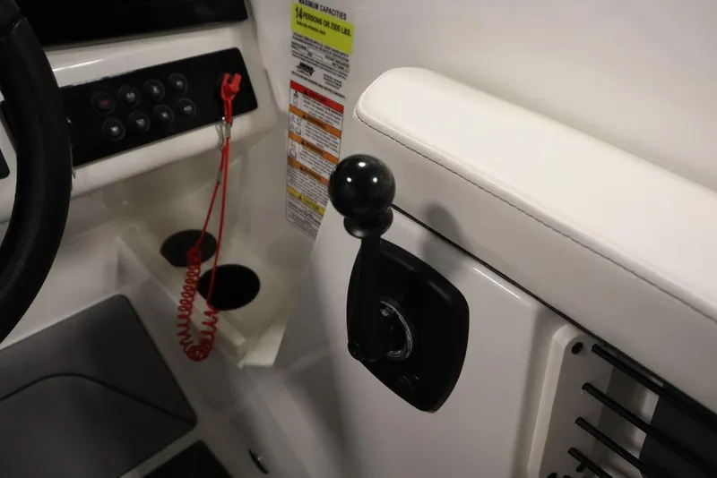 Slide: The Image of 2024 Heyday H22 boat control panel with throttle lever and safety lanyard. - 36