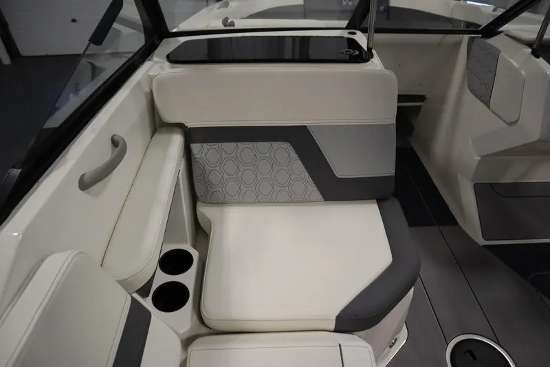 Slide: The Image of 2024 Heyday H22 boat interior seating with cup holders and modern design. - 42