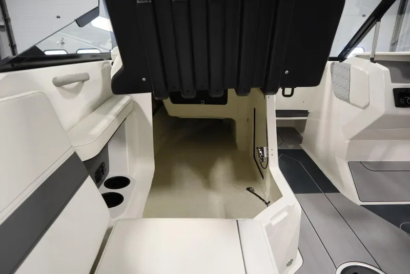 Slide: The Image of 2024 Heyday H22 boat interior with storage compartment and seating area. - 43