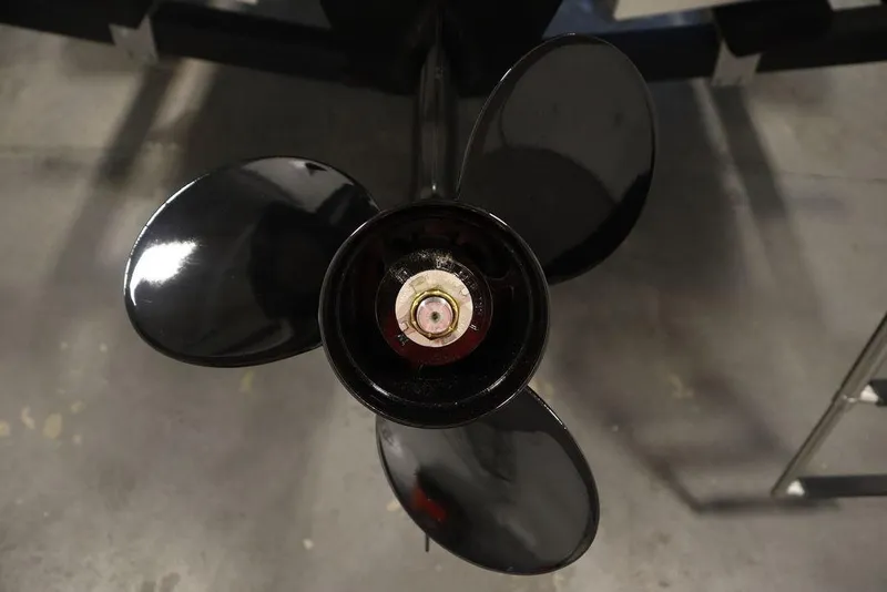 Slide: The Image of Close-up of 2024 Bayliner VR4 Bowrider boat propeller. - 32