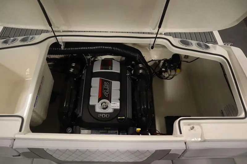 Slide: The Image of 2024 Bayliner VR4 Bowrider engine compartment with MerCruiser 4.5L engine. - 38