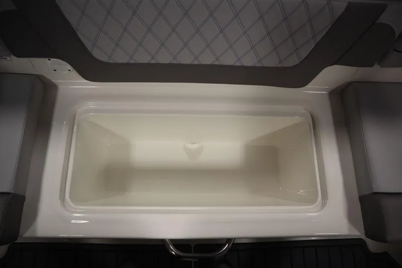 Slide: The Image of 2024 Bayliner VR4 Bowrider storage compartment with cushioned seating. - 46