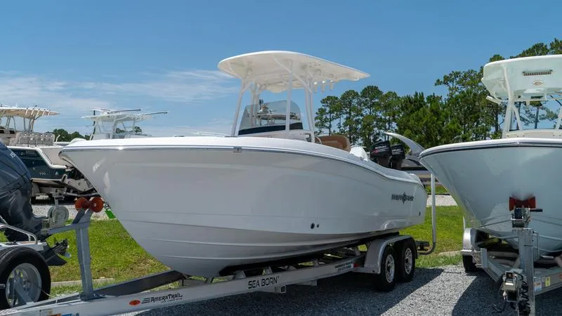 The Image of 2024 NauticStar 222 OSL boat on trailer, ready for transport. - 1