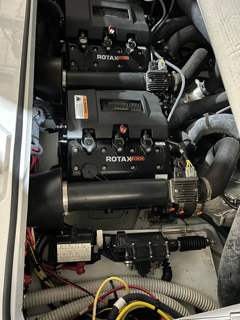 Slide: The Image of 2021 Scarab 255 Open ID engine compartment with Rotax engines. - 5