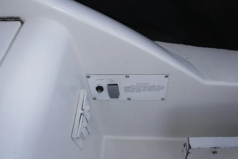 Slide: The Image of Control panel on a 1996 Trojan 440 Express boat interior. - 13