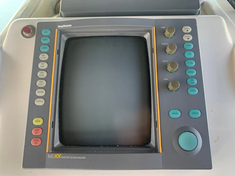 Slide: The Image of Raytheon radar display on 1996 Trojan 440 Express boat dashboard. - 25