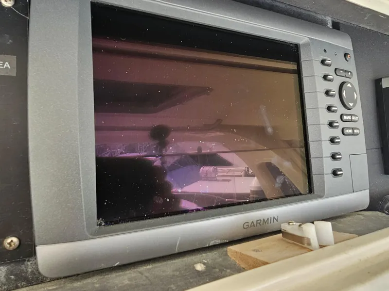 Slide: The Image of Garmin navigation system on a 1999 Ocean Yachts 48 Super Sport. - 11