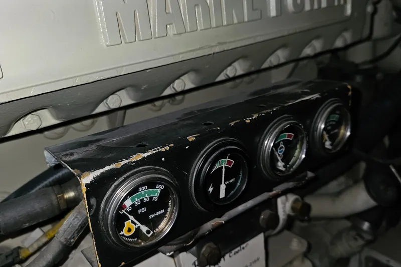 Slide: The Image of 1999 Ocean Yachts 48 Super Sport cabin with twin beds and wall-mounted TV. - 24