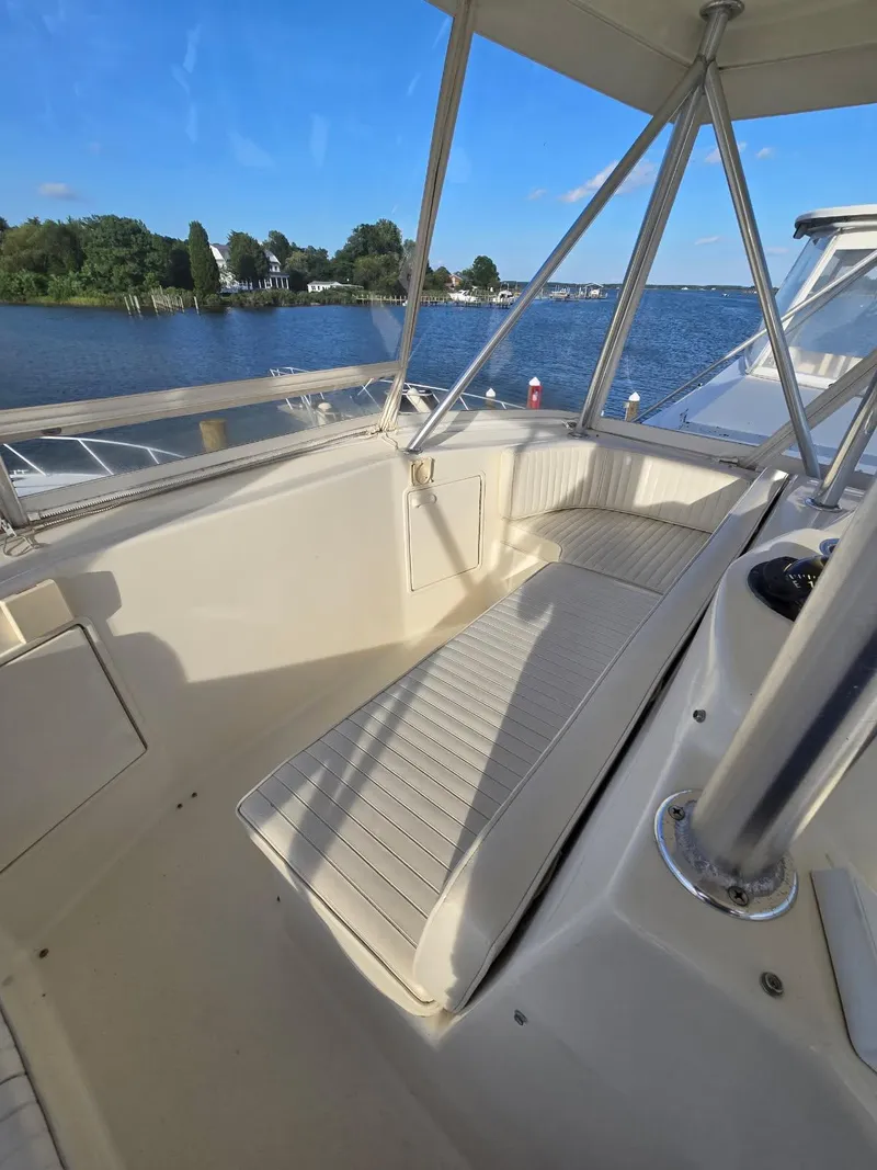 Slide: The Image of Luxurious interior of 1999 Ocean Yachts 48 Super Sport with plush seating and elegant decor. - 25