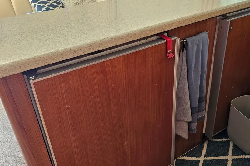 Slide: The Image of Bathroom interior of 1999 Ocean Yachts 48 Super Sport with white cabinetry. - 15