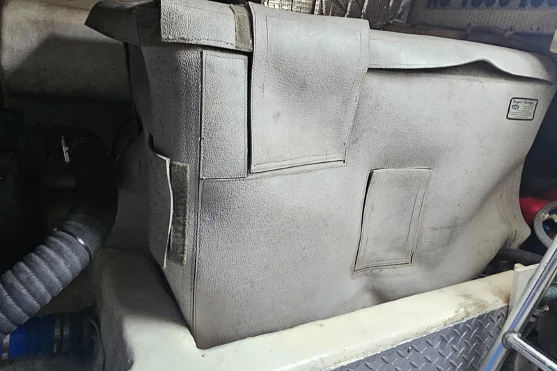 Slide: The Image of Engine compartment of 1999 Ocean Yachts 48 Super Sport with visible components. - 21