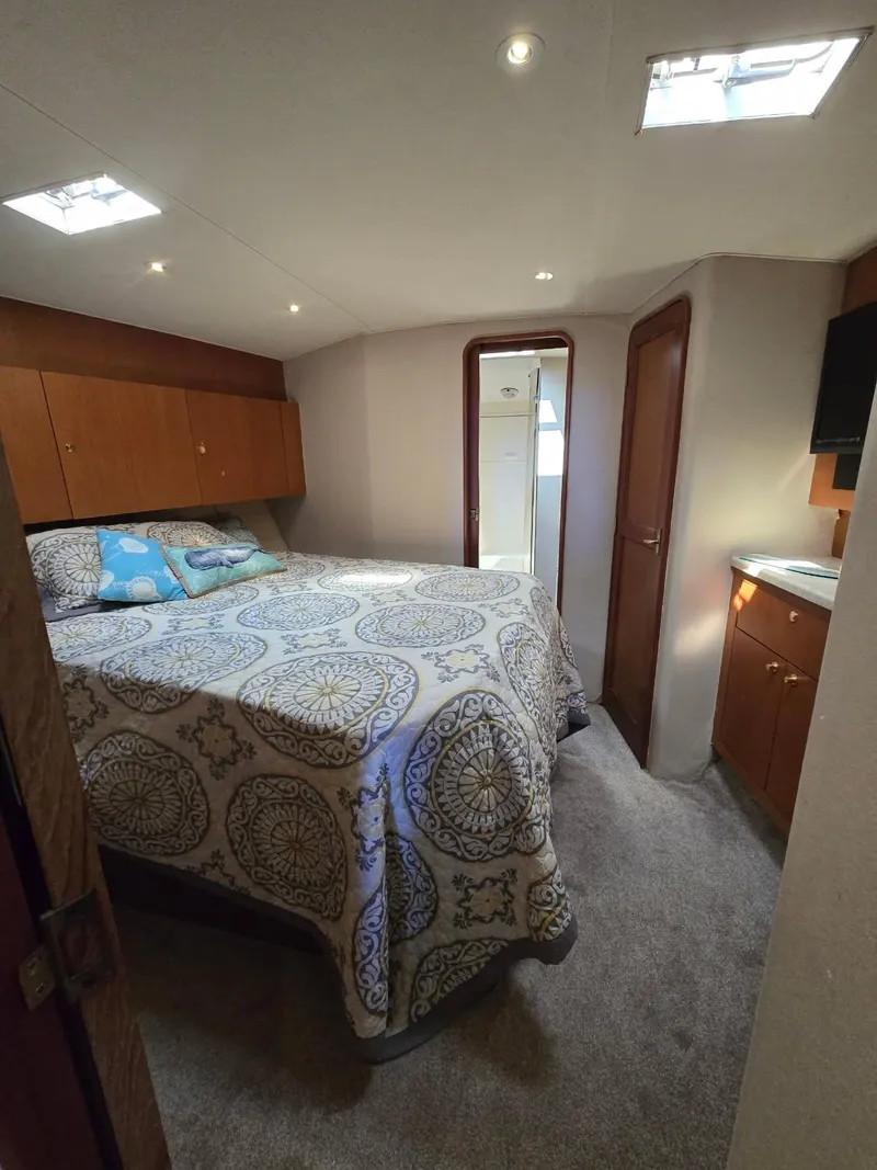 Slide: The Image of Luxurious interior of 1999 Ocean Yachts 48 Super Sport with elegant seating and modern amenities. - 28