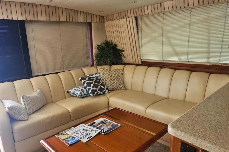 Slide: The Image of Luxurious interior of 1999 Ocean Yachts 48 Super Sport with beige leather seating. - 5