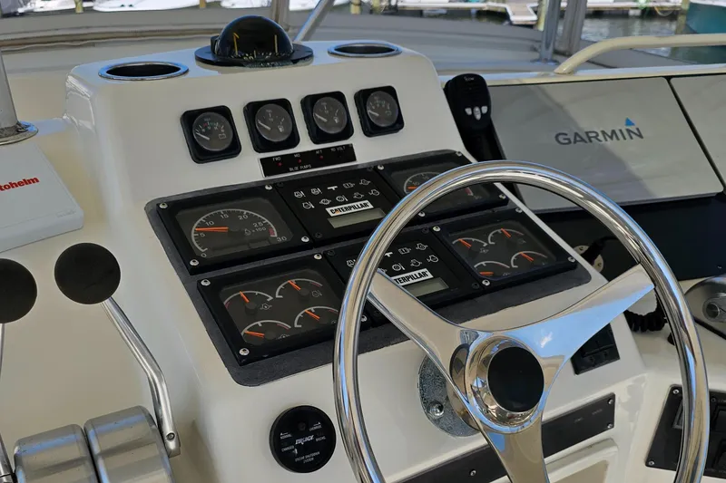 Slide: The Image of 1999 Ocean Yachts 48 Super Sport helm with Garmin navigation system. - 7