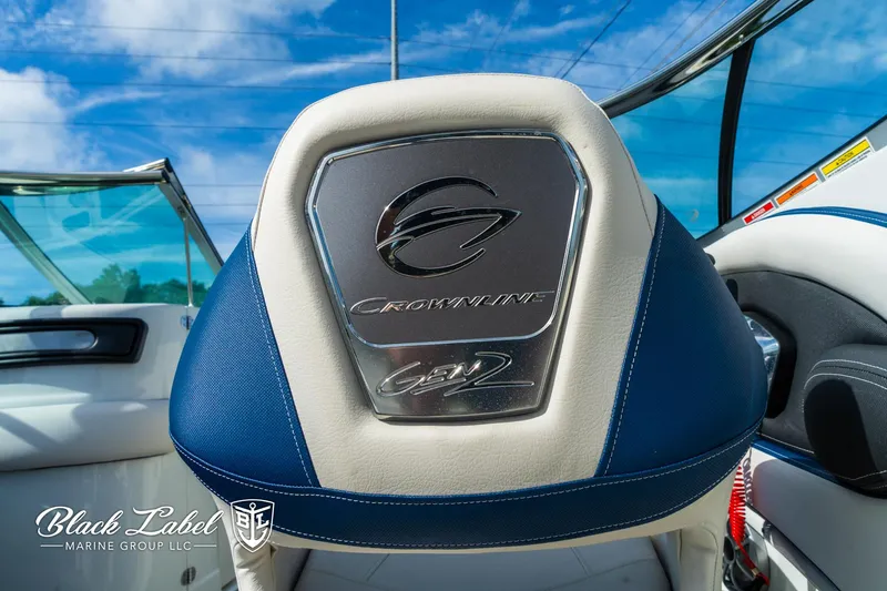 Slide: The Image of 2024 Crownline 260 XSS boat interior with branded seat design. - 31