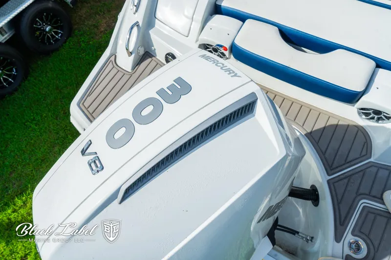 Slide: The Image of 2024 Crownline 260 XSS boat with Mercury 300 V8 engine, rear deck view. - 37