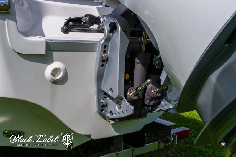 Slide: The Image of 2024 Crownline 260 XSS boat engine detail, Black Label Marine Group branding. - 42