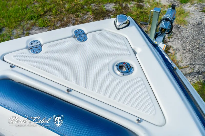 Slide: The Image of 2024 Crownline 260 XSS boat deck with sleek design and premium features. - 9