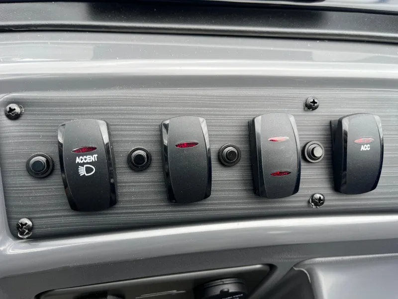 Slide: The Image of Control panel of 2024 Bennington 188 SVL boat with accent and accessory switches. - 11