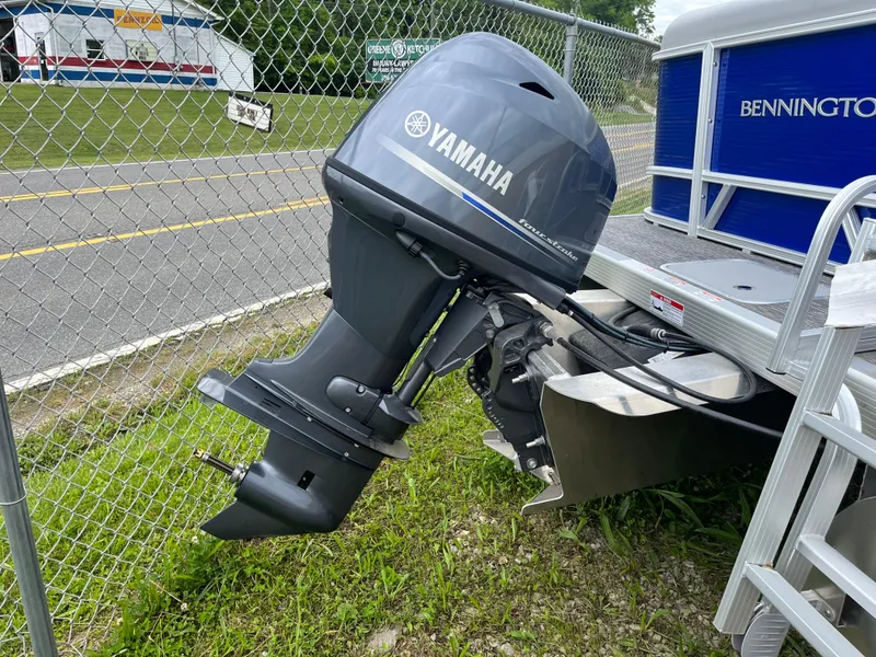 Slide: The Image of 2024 Bennington 188 SVL pontoon boat with Yamaha outboard motor. - 14
