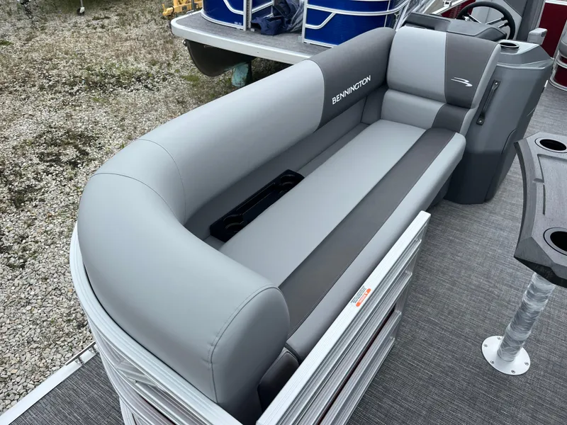 Slide: The Image of 2024 Bennington 20 SVSR pontoon boat with gray seating and modern design. - 5