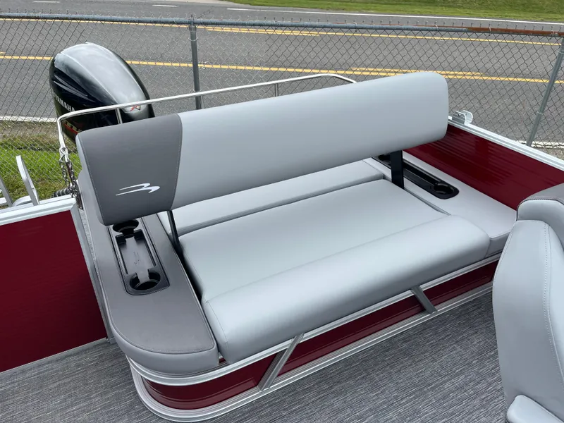 Slide: The Image of 2024 Bennington 20 SVSR pontoon boat with gray and red seating. - 9
