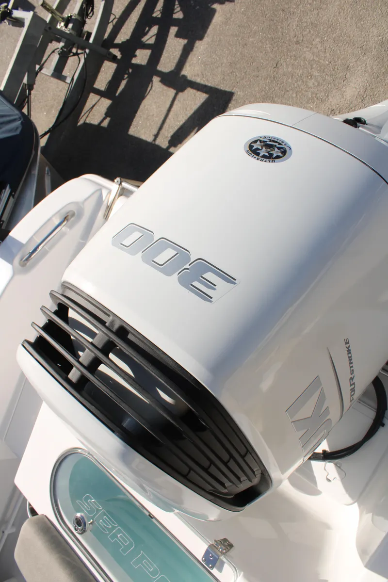 Slide: The Image of 2024 Sea Pro 240 boat with a powerful 300 horsepower engine. - 4