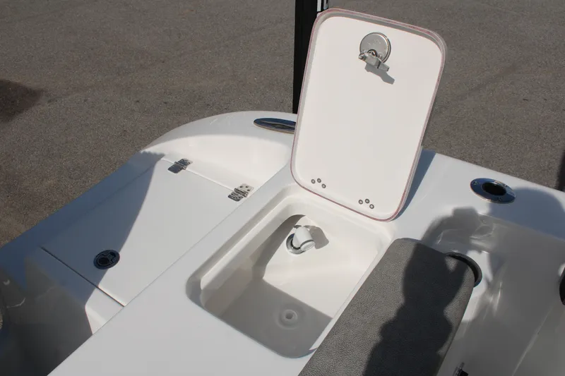 Slide: The Image of 2024 Sea Pro 240 boat storage compartment with open hatch. - 9