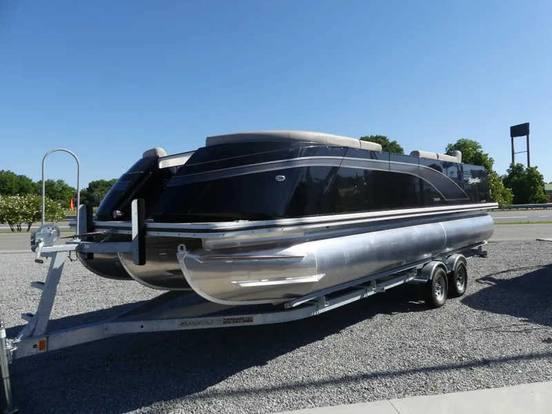 The Image of 2023 Silver Wave 2410 SW3 RLP pontoon boat on a trailer. - 0