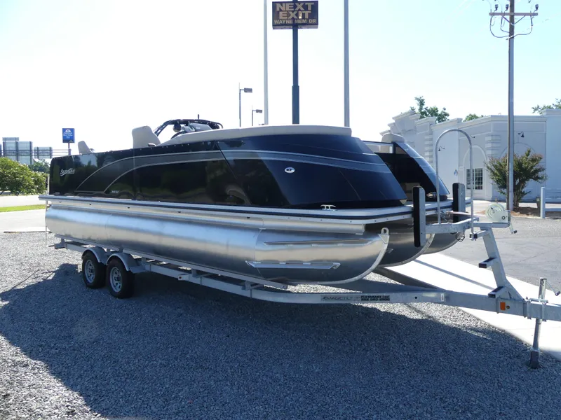 Slide: The Image of 2023 Silver Wave 2410 SW3 RLP pontoon boat on a trailer. - 1