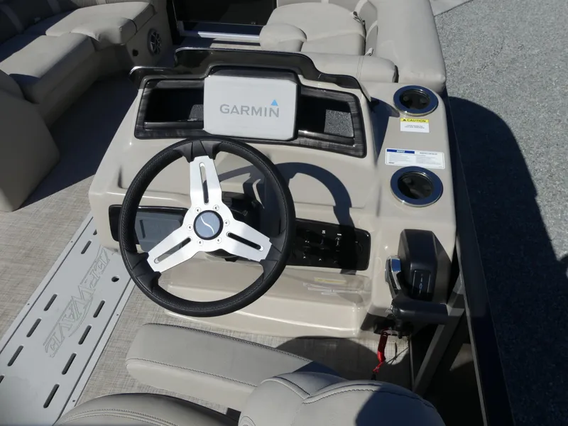 Slide: The Image of 2023 Silver Wave 2410 SW3 RLP boat dashboard with Garmin navigation system. - 10