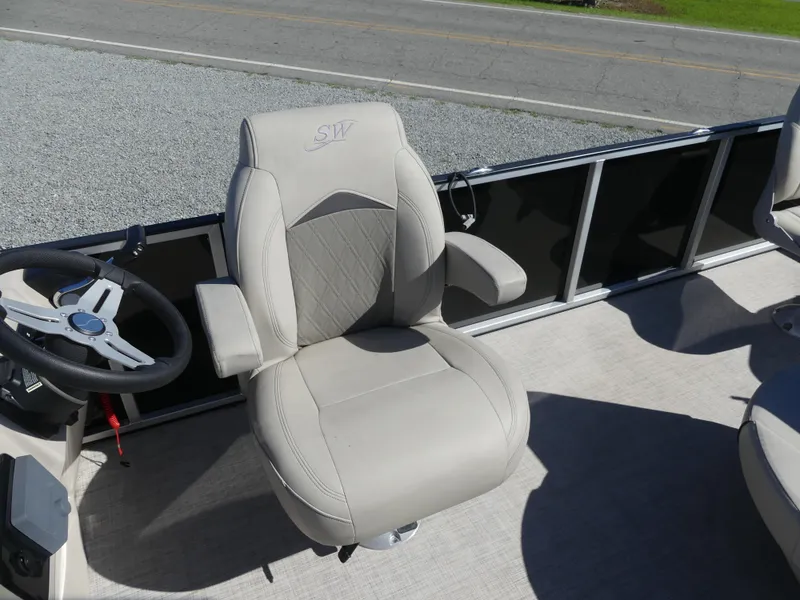 Slide: The Image of Captain's chair of 2023 Silver Wave 2410 SW3 RLP pontoon boat. - 11
