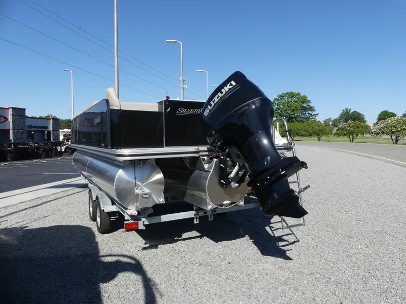 Slide: The Image of 2023 Silver Wave 2410 SW3 RLP pontoon boat with Suzuki outboard motor. - 3