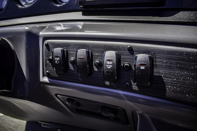 Slide: The Image of Control panel of 2024 Bennington 22 SVSB boat with various switches. - 18