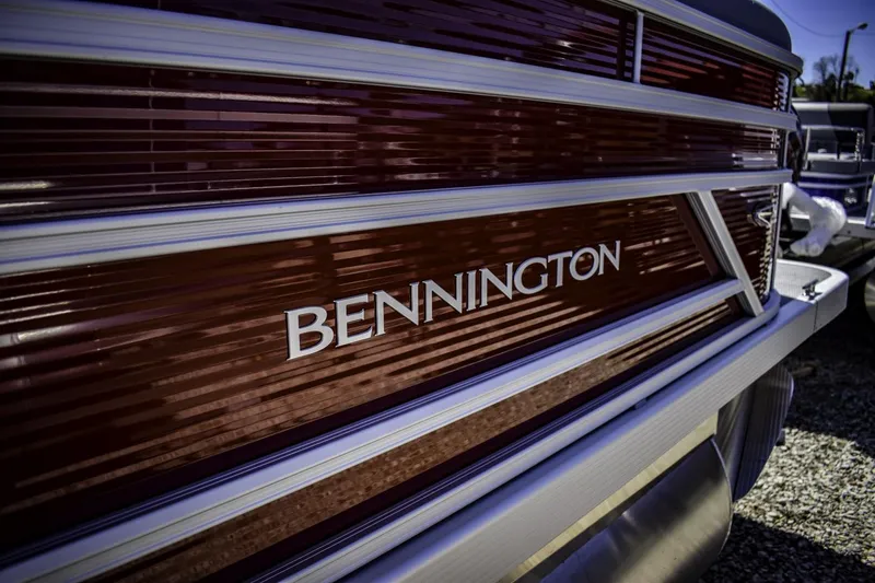Slide: The Image of 2024 Bennington 22 SVSB pontoon boat close-up with logo. - 3