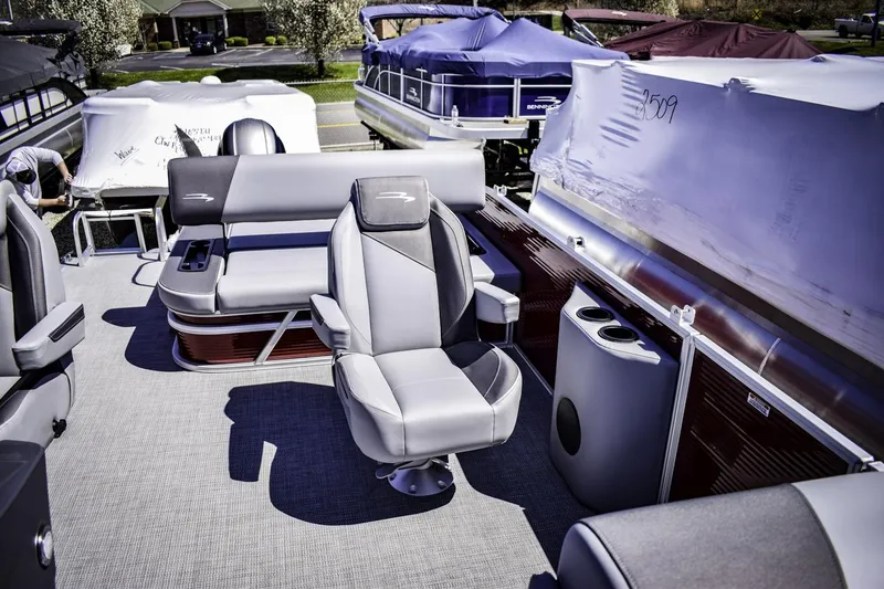 Slide: The Image of 2024 Bennington 22 SVSB pontoon boat interior with luxurious seating. - 8