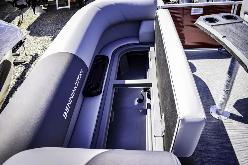 Slide: The Image of 2024 Bennington 22 SVSB boat interior seating and storage compartment. - 9