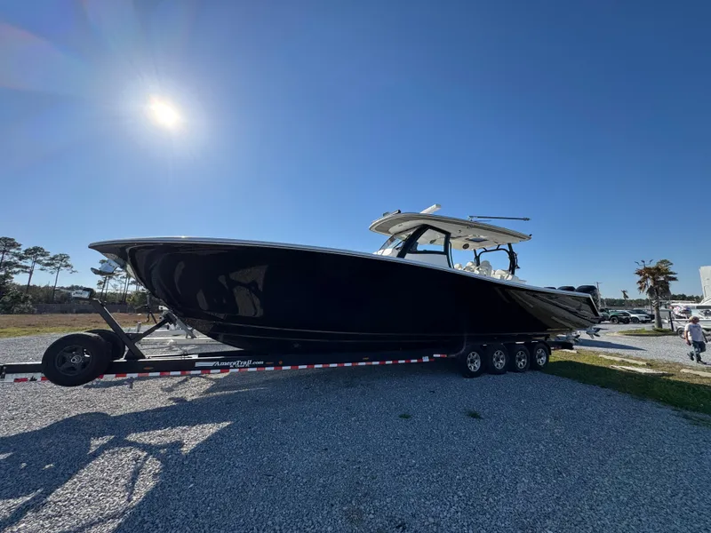 The Image of 2019 Blackwater 43SF boat on trailer under clear blue sky. - 1